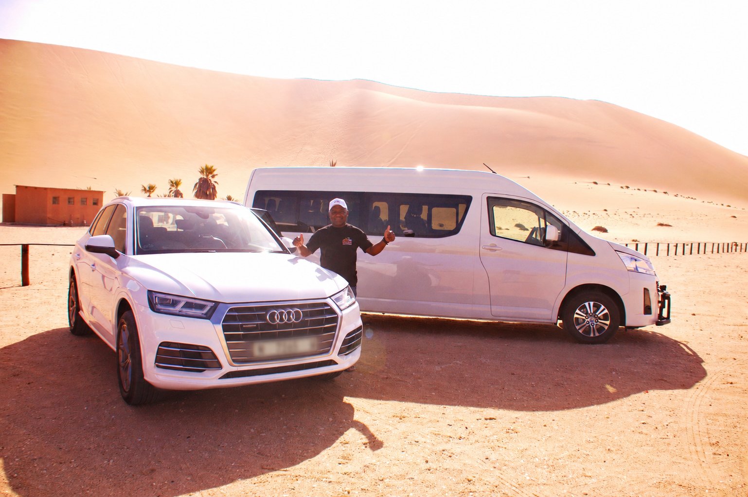 SEGEN fleet - Audi SUV and minibus at Namibian dunes